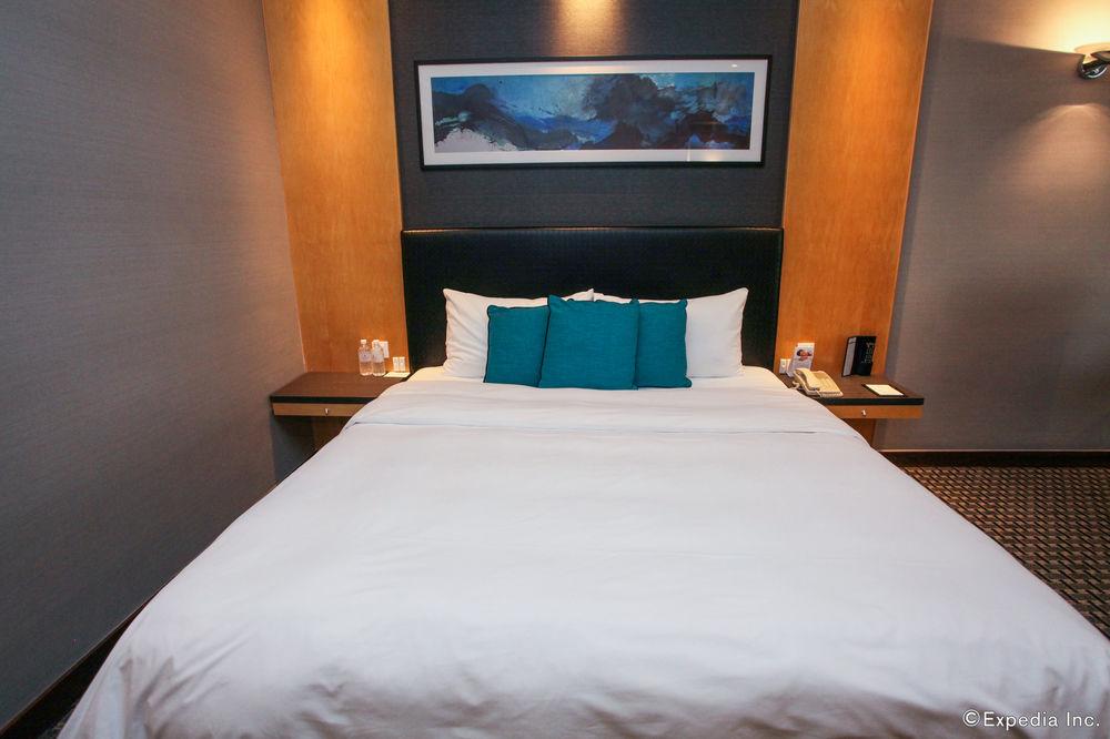 M Hotel Singapore City Centre Exteriér fotografie A bed